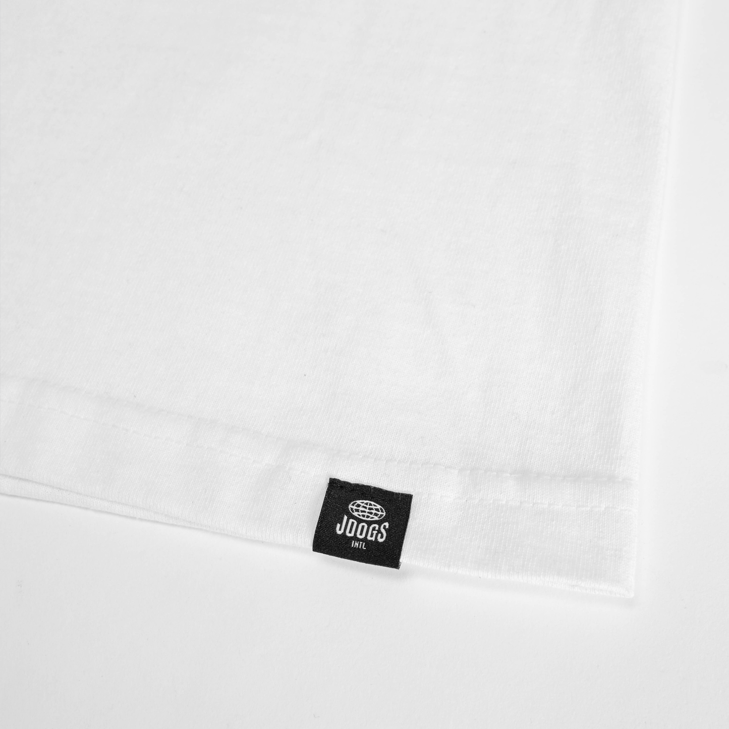 JOOGS LOGO TEE - WHITE - FRONT PRODUCT SHOT DETAIL